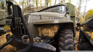 Illustration for article titled Excellent pictures of abandoned Russian military vehicles found in the woods
